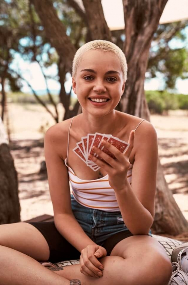 girl playing cards